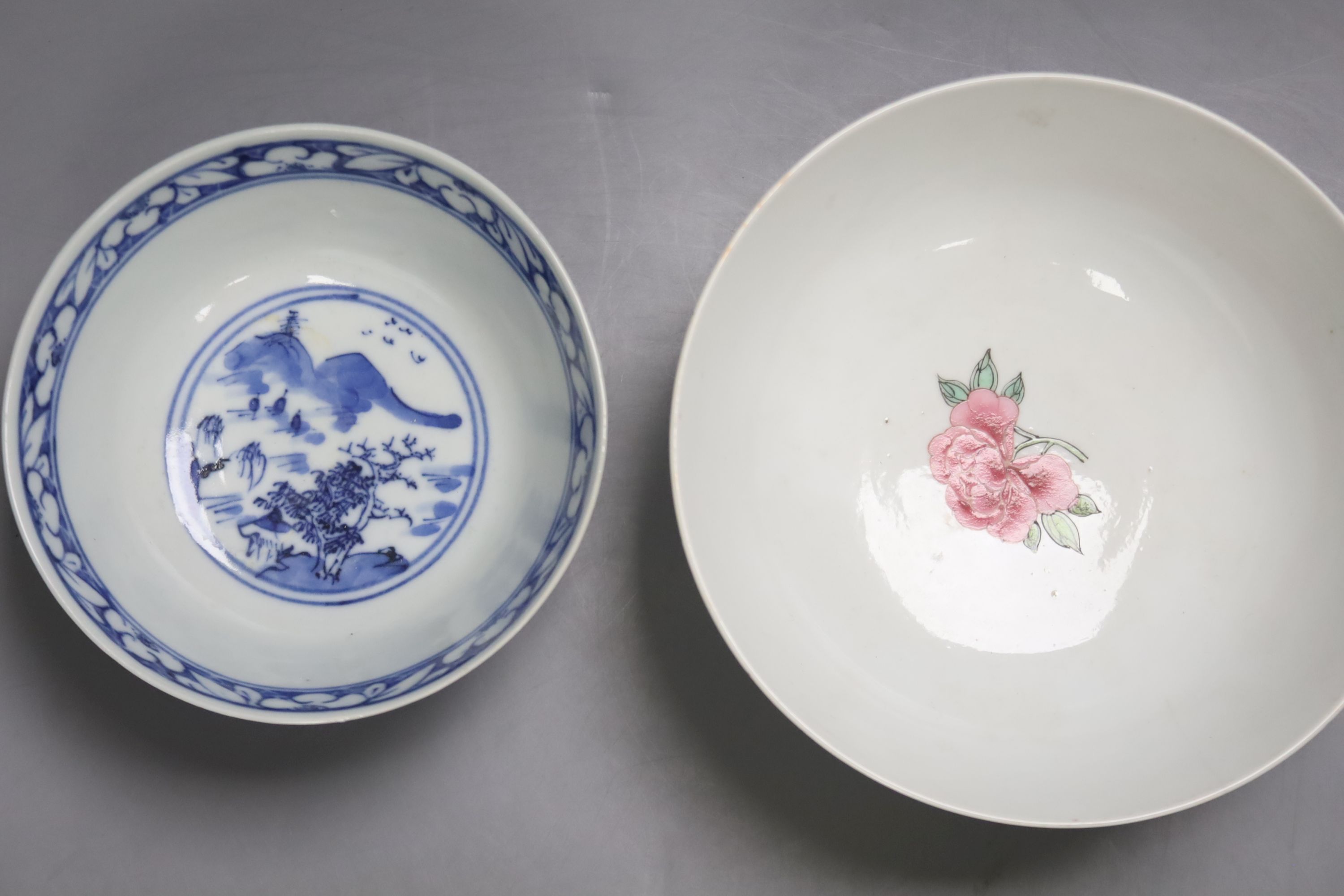 A Chinese blue and white footed porcelain bowl, Kangxi mark to underside, c1900, 12cm diameter 6cm high, together with a further hand painted famille rose, 15cm diameter, 7cm high